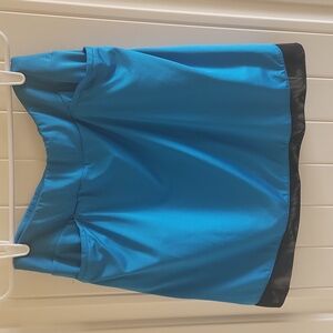 Tail brand size medium,  blue skort, black hem.